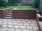 Walls, steps and sunken patio in Bearwood.