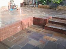 Raj green natural stone with circle and steps in Selly Oak